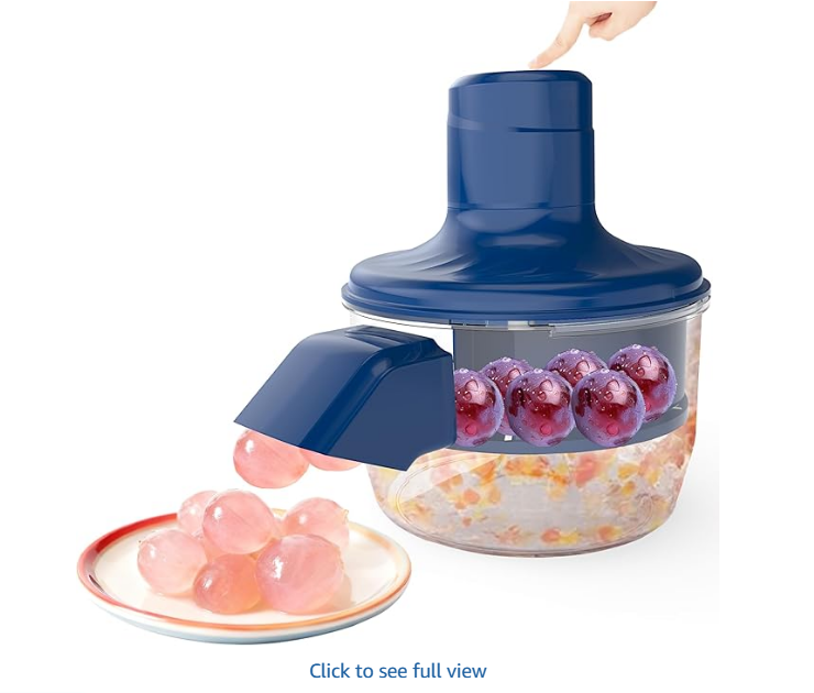 Electric fruit peeler removing skin from grapes and cherry tomatoes