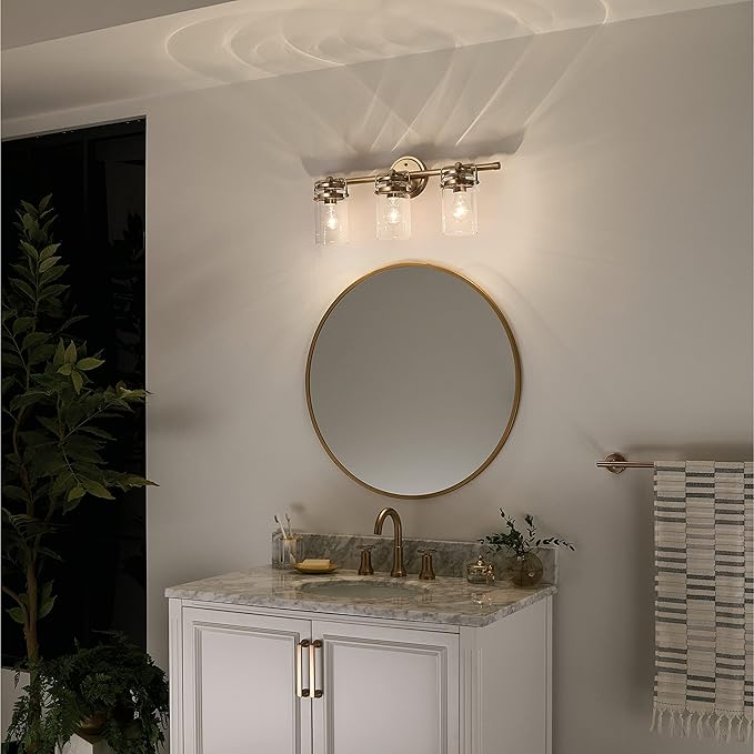 Kichler, Brinley 24" 3 Light Vanity Light with Clear Glass in Champagne Bronze for Bathroom and Powder Room, (24" W x 10.25" H), 45689CPZ